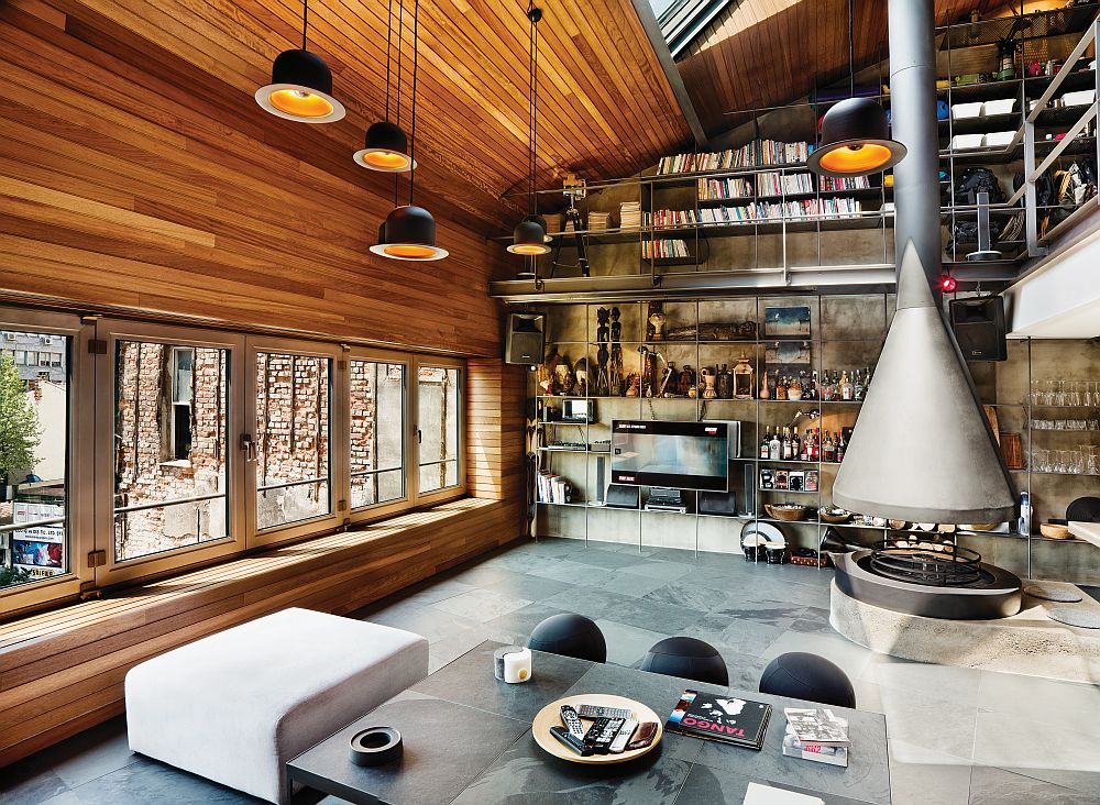 Living-room-with-industrial-style-high-ceiling-and-innovative-storage-system