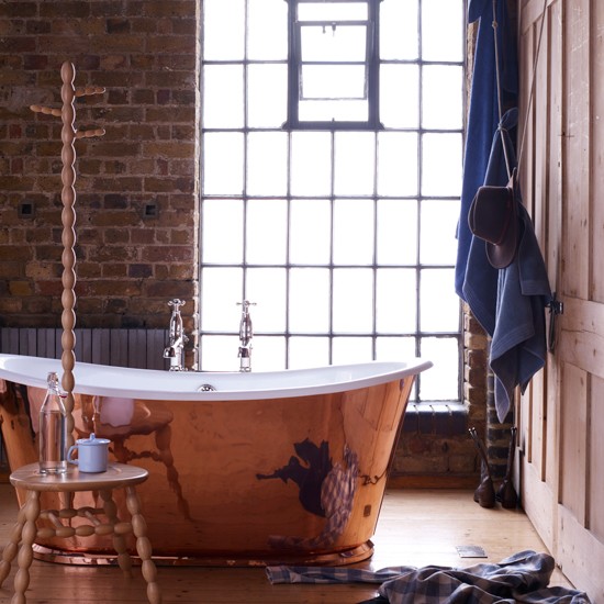 Luxurious Rustic Bathroom with Copper Bathtub