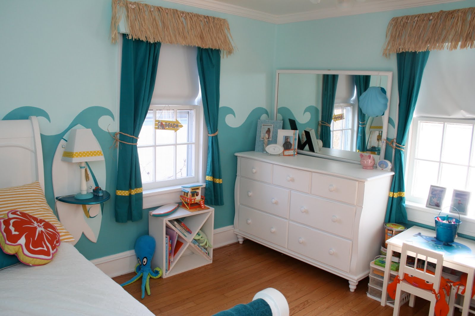 Beach Inspired Bedroom With Blue Sea Wall