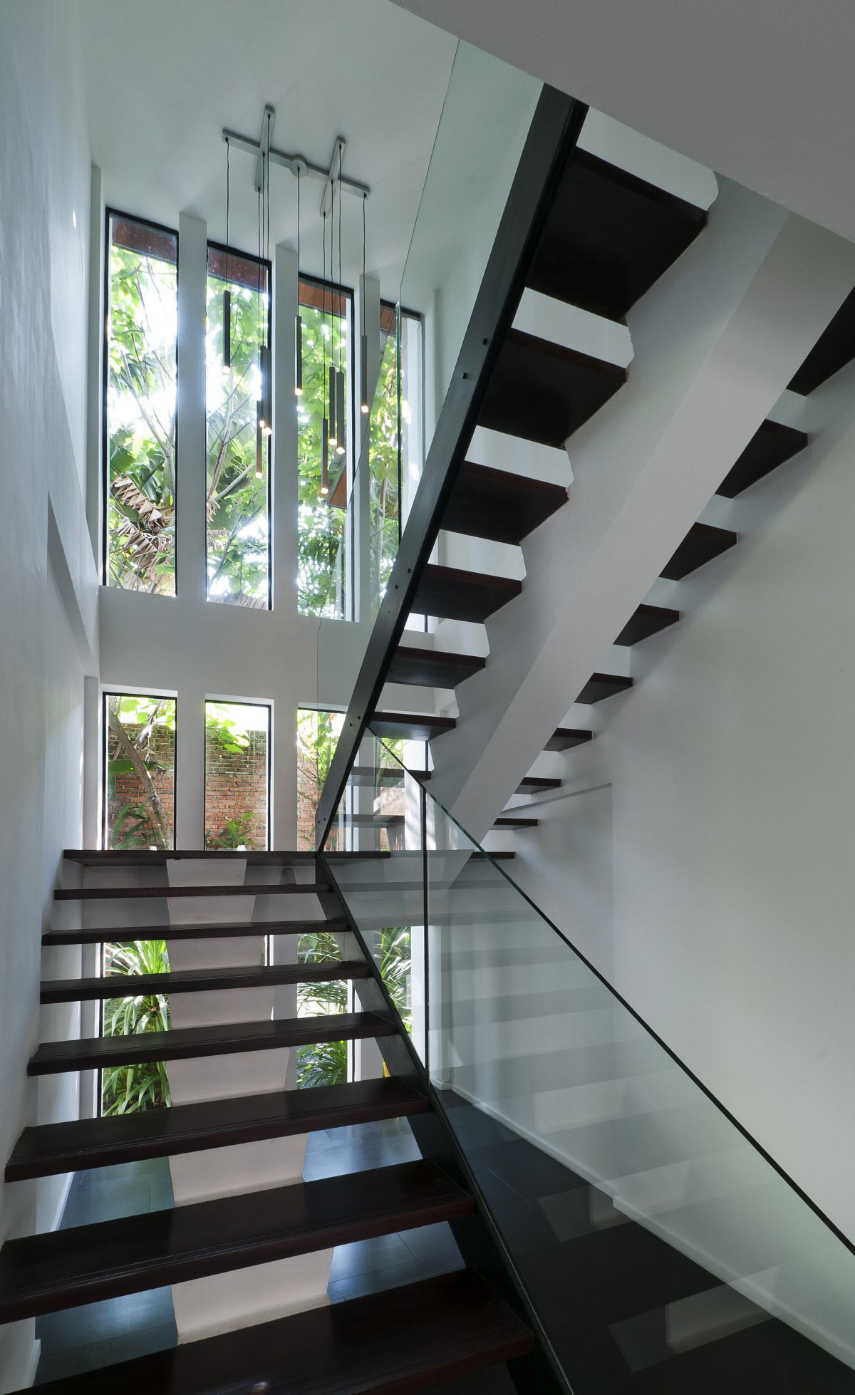 Dark Wood & Glass Stairways