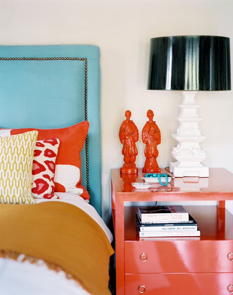 Eclectic Bedroom Decorating ideas with coral colors bedside table bold colors bright colors decorative