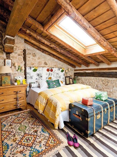 Eclectic bedroom design with massive velux windows