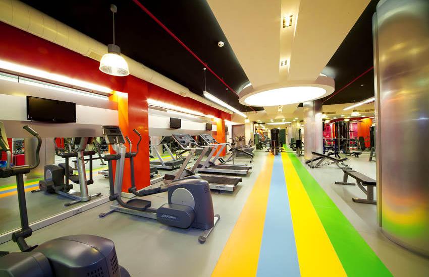 Fitness center with Ceiling Treatments and Pendants