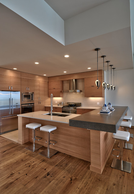 contemporary kitchen with wood flooring and shelf along with pendant lights