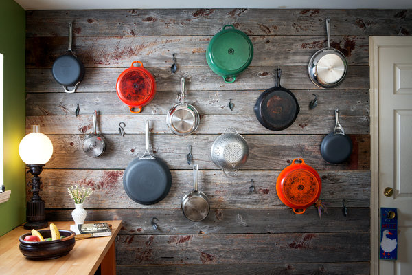 Colorful pots and pans as wall art