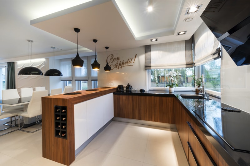 Modern kitchen interior design in black, white style and wood