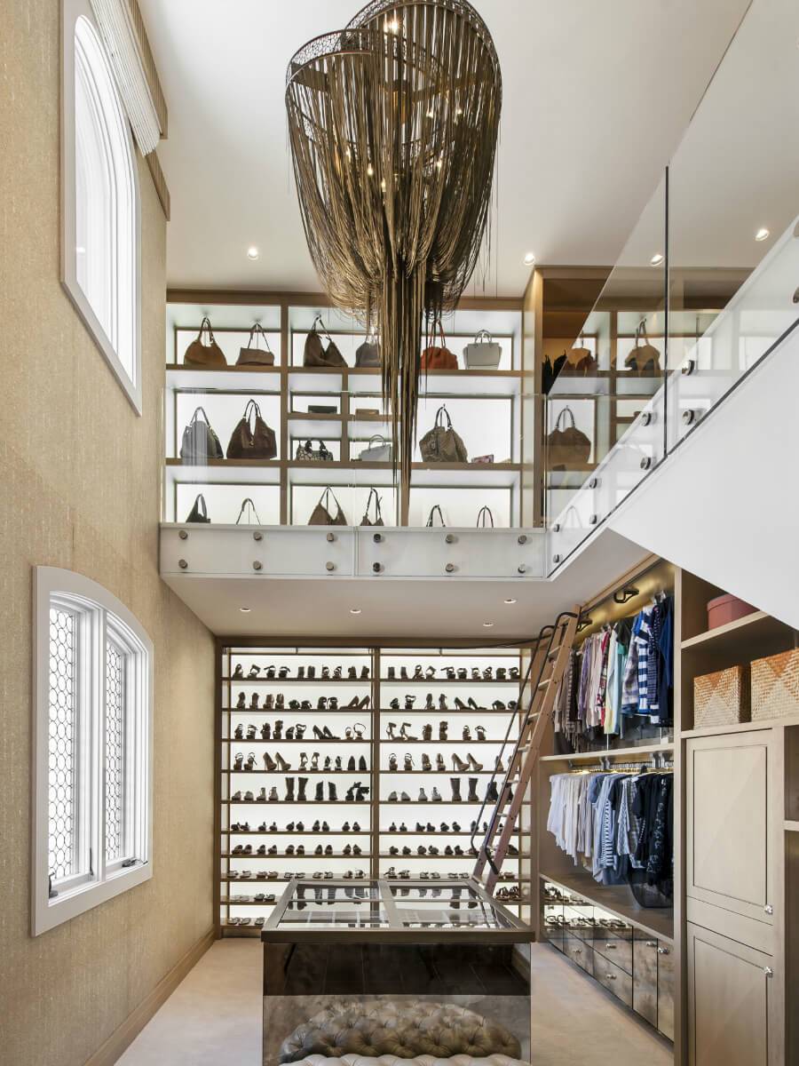 Stunning 2-story walk-in closet with bag and shoe storage