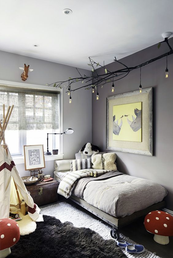child room decorate with tones of grey, yellow and red