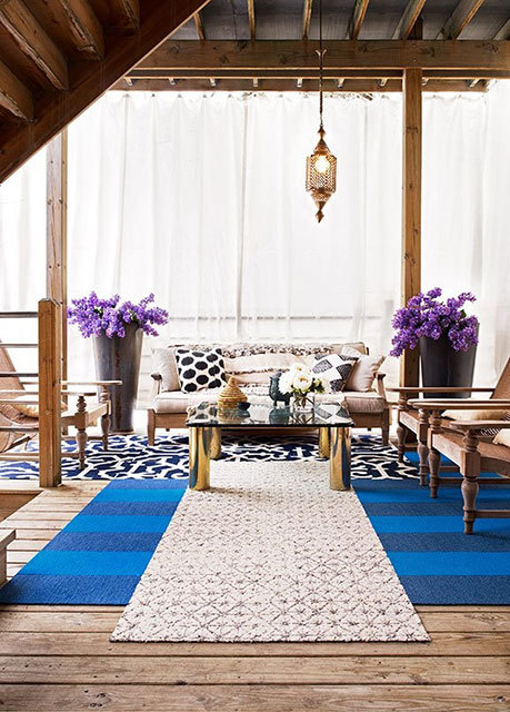 outdoor space layered rugs
