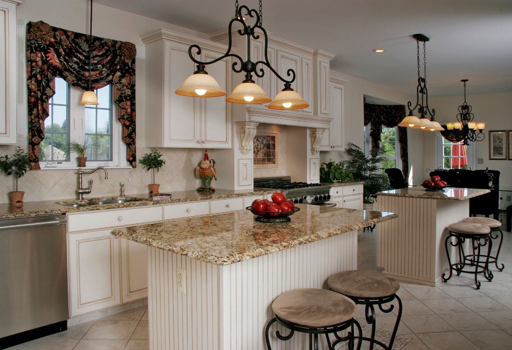 traditional-white-kitchen-featuring-floor-to-ceiling-cabinets-an