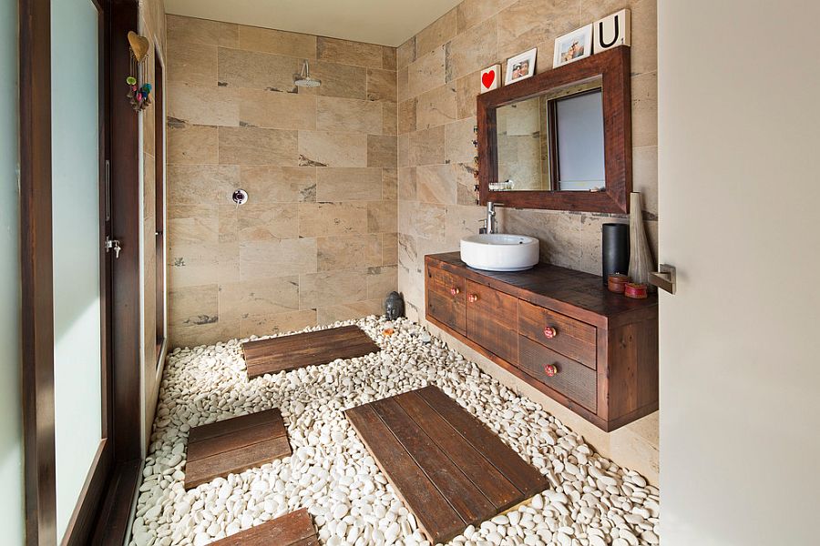 Natural-stone-and-pebbles-create-an-exotic-tropical-style-bathroom