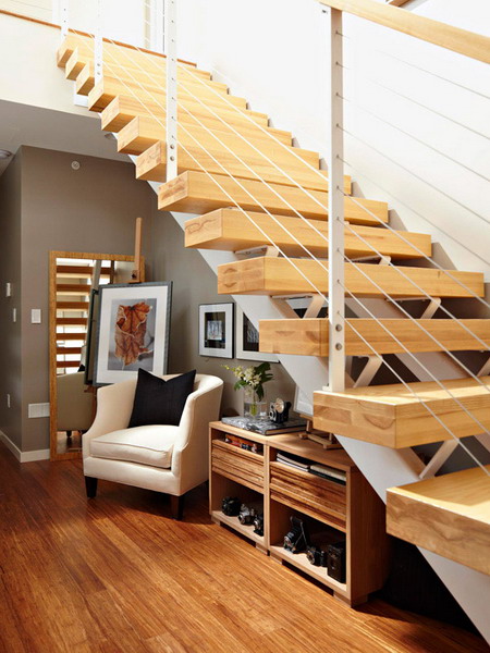 Storage and sitting area under stairs