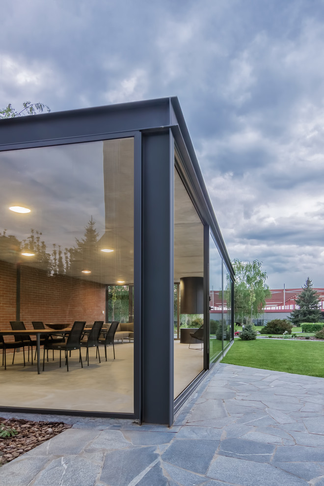 Industrial Porch Design With Outdoor Kitchen