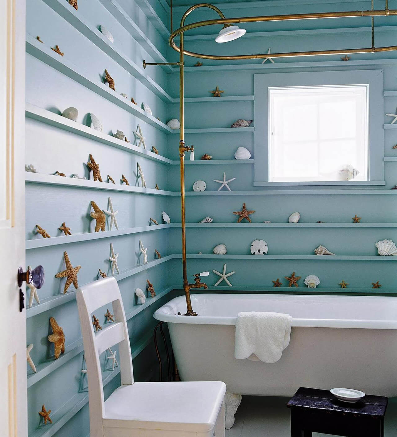 Small Beach Style Bathroom With Monochromatic Ledge Shelves