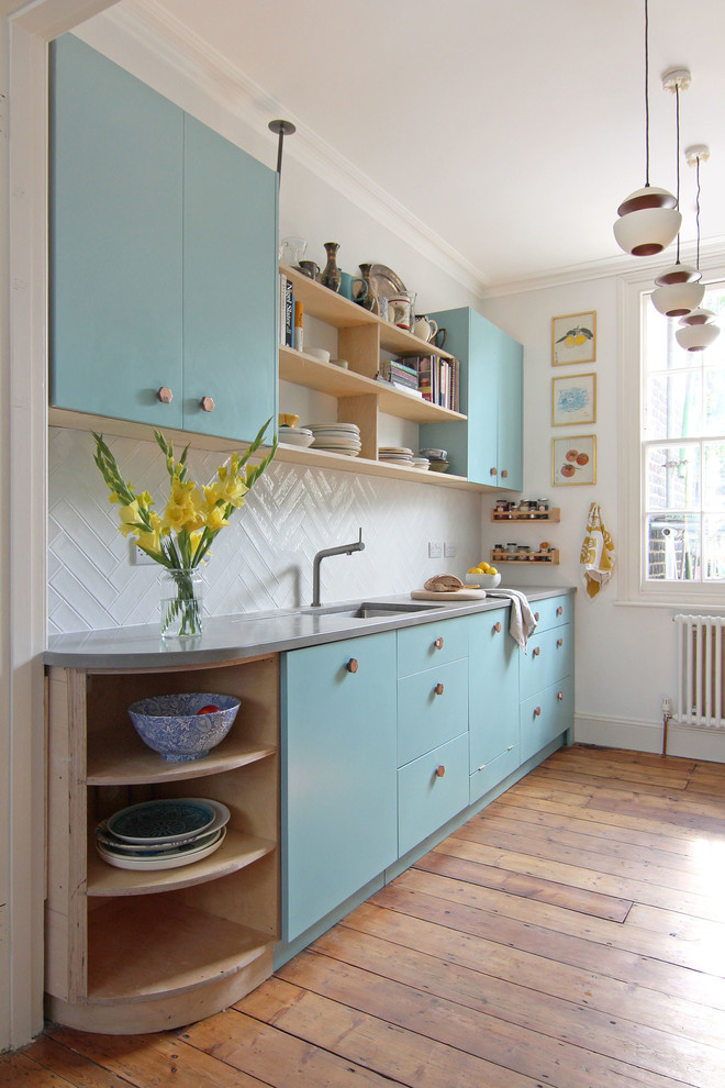 Scandinavian Kitchen With Copper Handles and Concrete Worktop