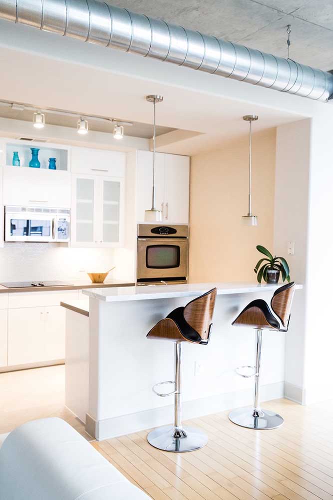 02. Small modern planned kitchen with custom furniture; highlight to the pendants above the counter.