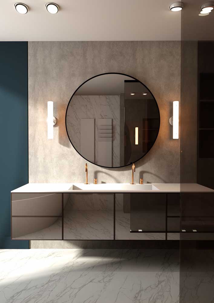 18. Modern decorated bathroom has neutral colors and slightly shiny surfaces.