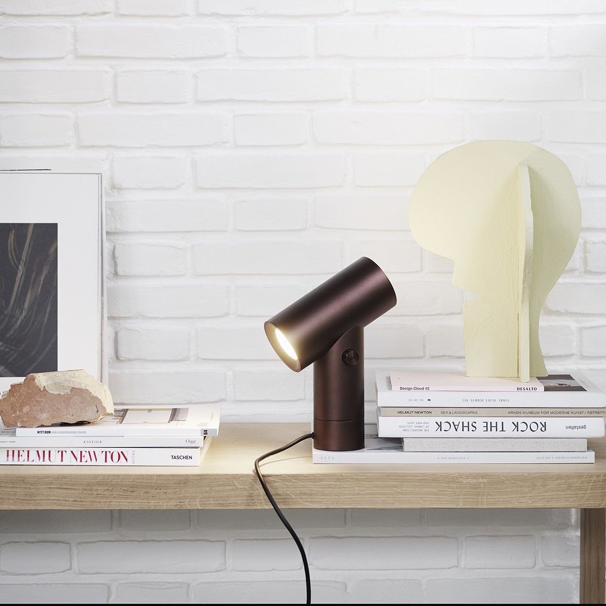 19 -A small contemporary lamp looking like a spot at Muuto
