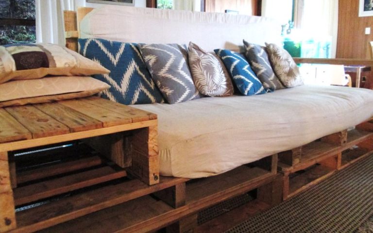 22. Use wood and make a nightstand for the pallet sofa
