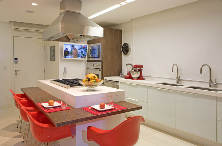 26. Kitchen with white center island and wooden countertop