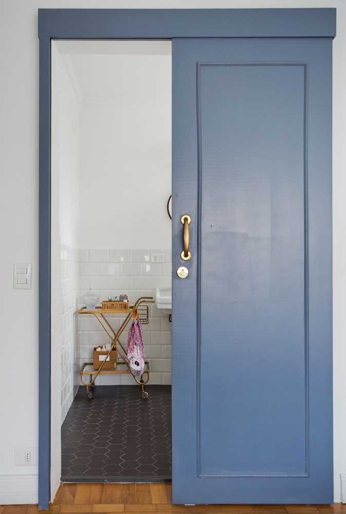 32 - A blue sliding door with golden handle for you to fall in love.