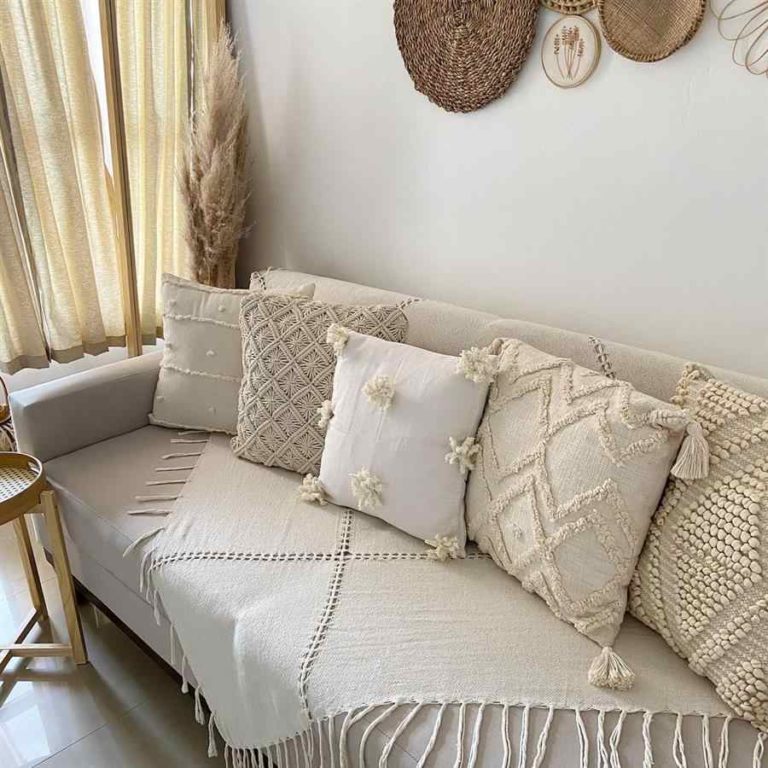8 - Sofa decorated with blanket and cushions
