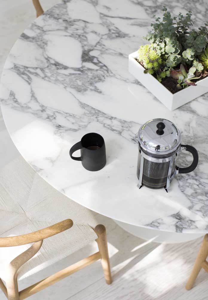 10. How about a table topped with white Carrara marble?
