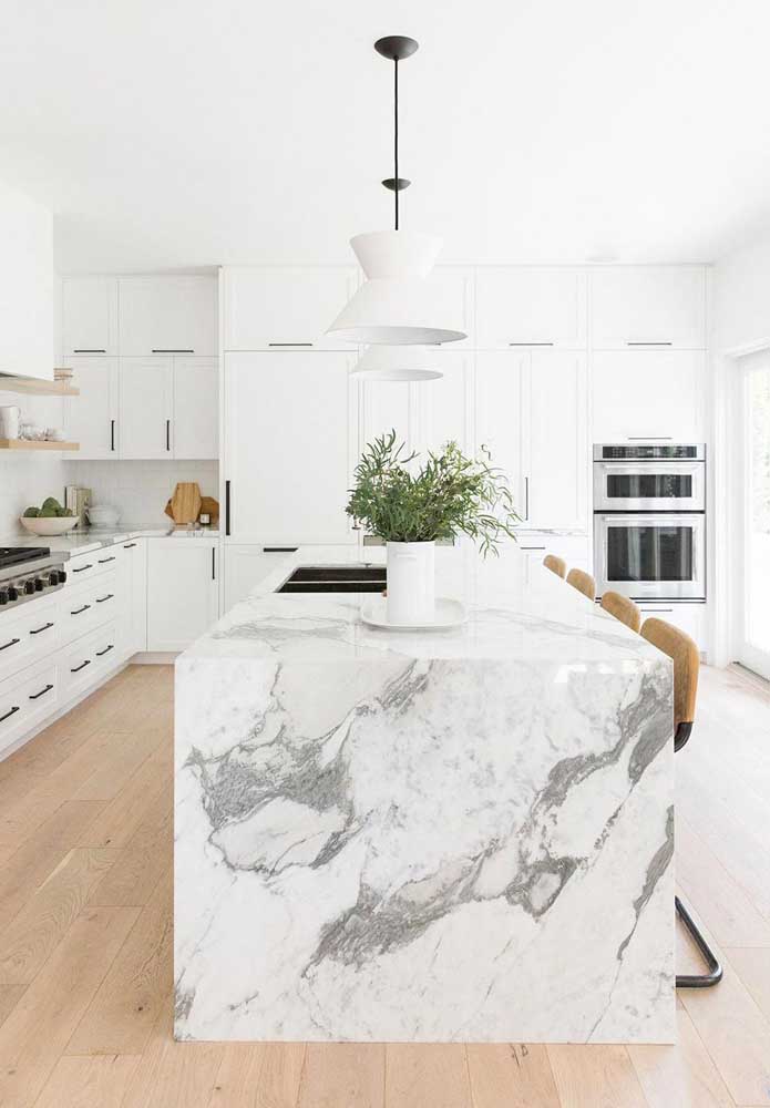 12. It's not just a kitchen island. It is an island made of Carrara marble.