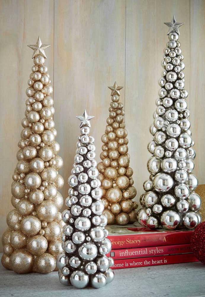 28. How about making several mini trees with gold and silver Christmas baubles?
