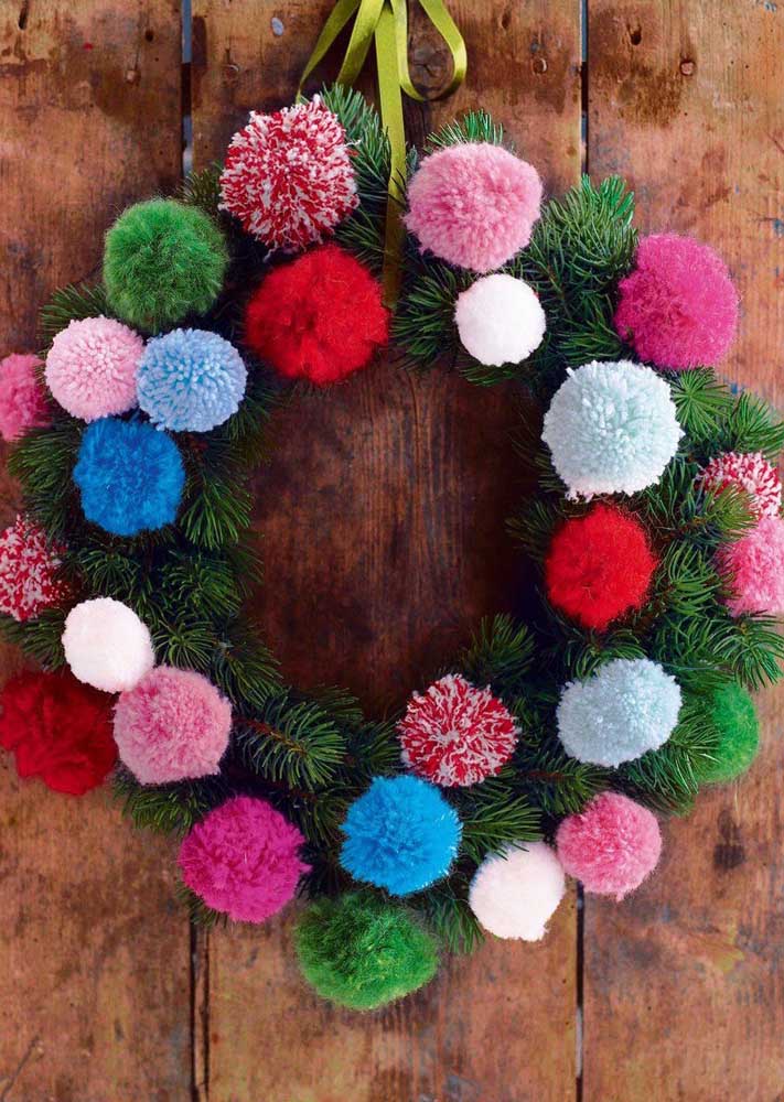 Christmas Wreath Combining Pine Branches and Wool Pompoms