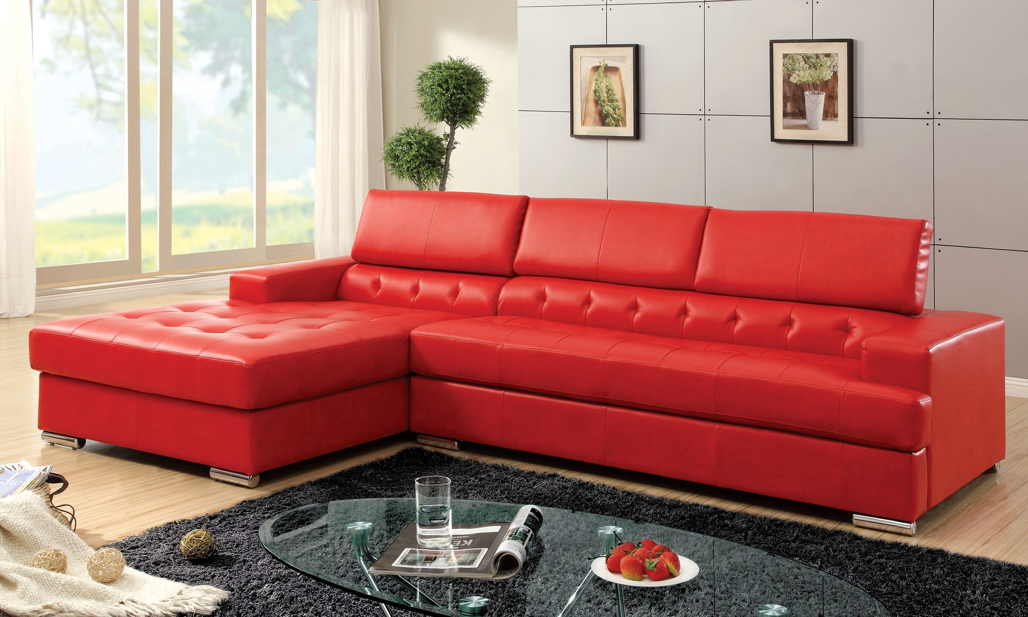 red leather button tufted sofa