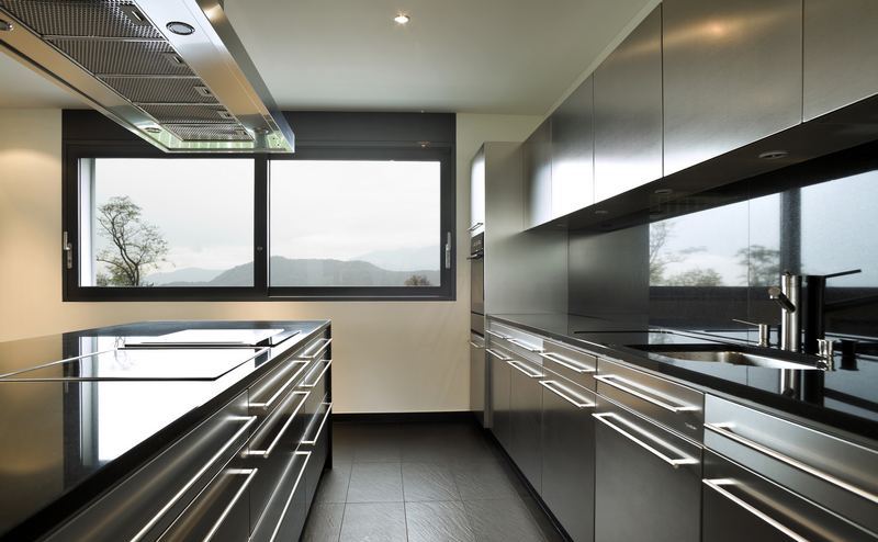Stainless Steel Kitchen Cabinets With Black Countertops 